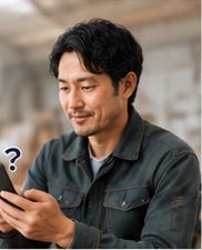 スマートフォンを確認する個人事業主